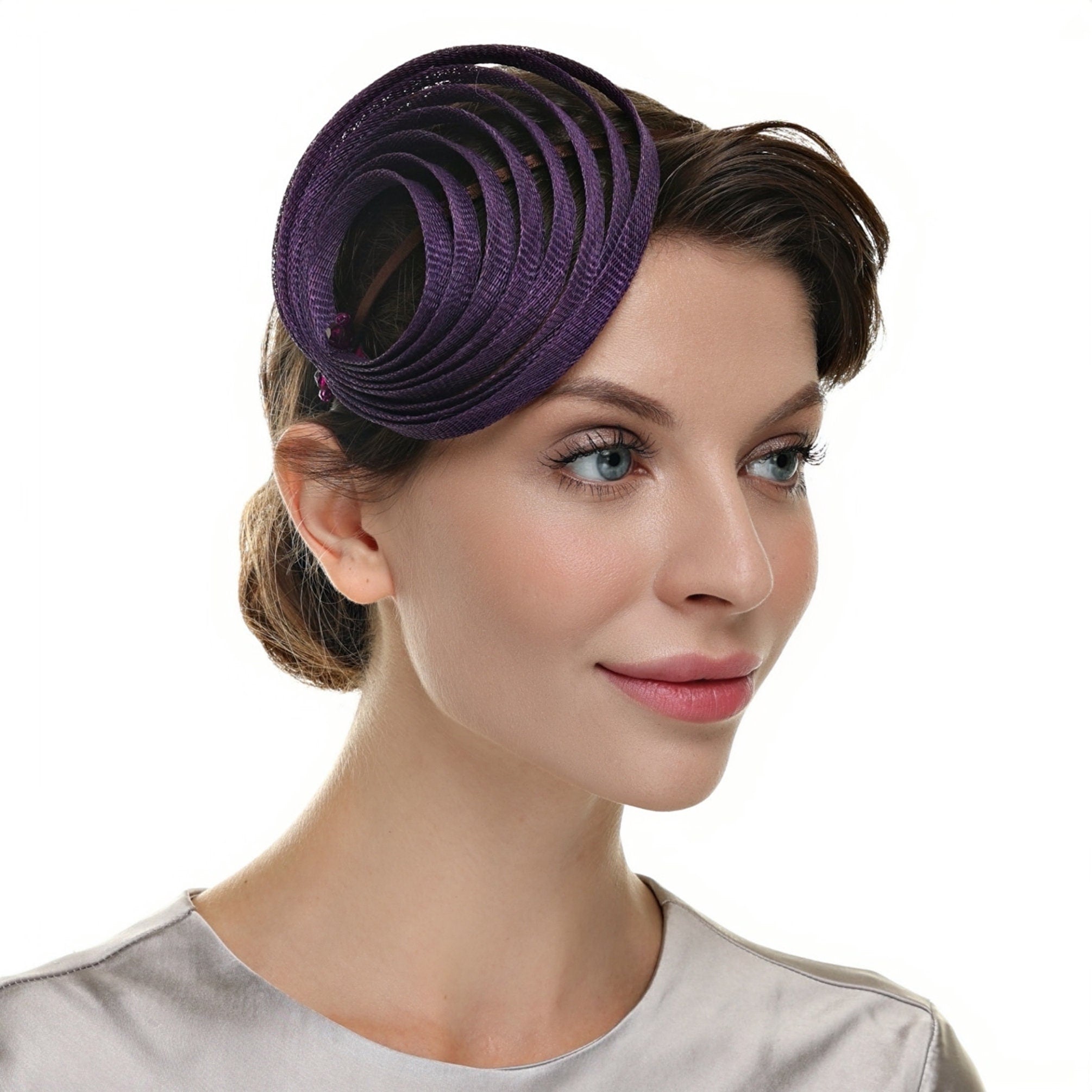 Purple fascinator