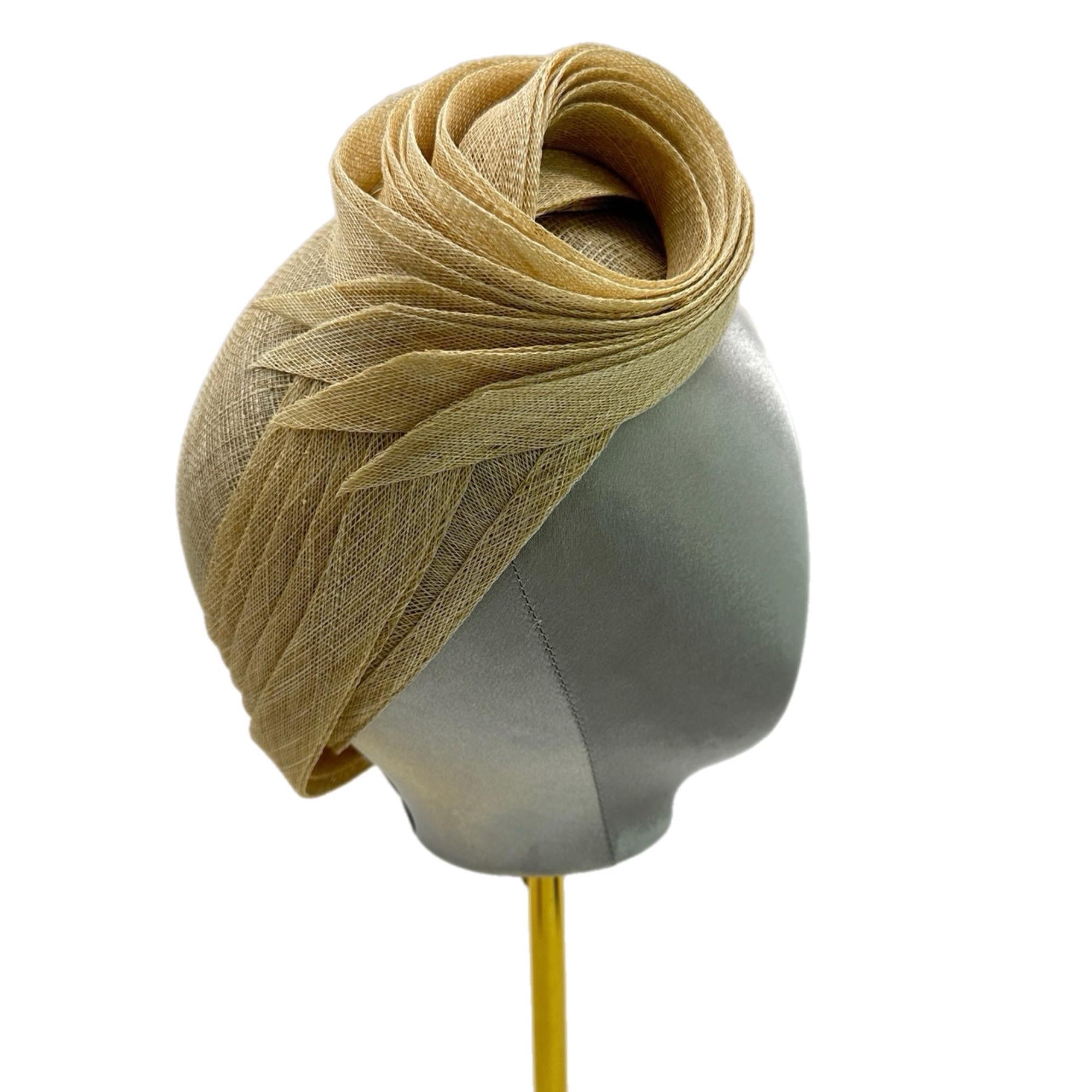 Beige straw hat with a unique, folded design.