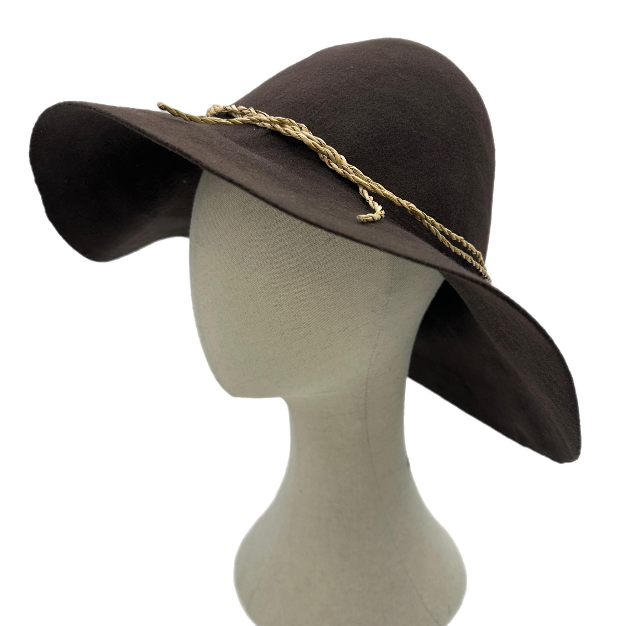 A wide-brimmed brown hillbilly hat with a braided tan rope trim